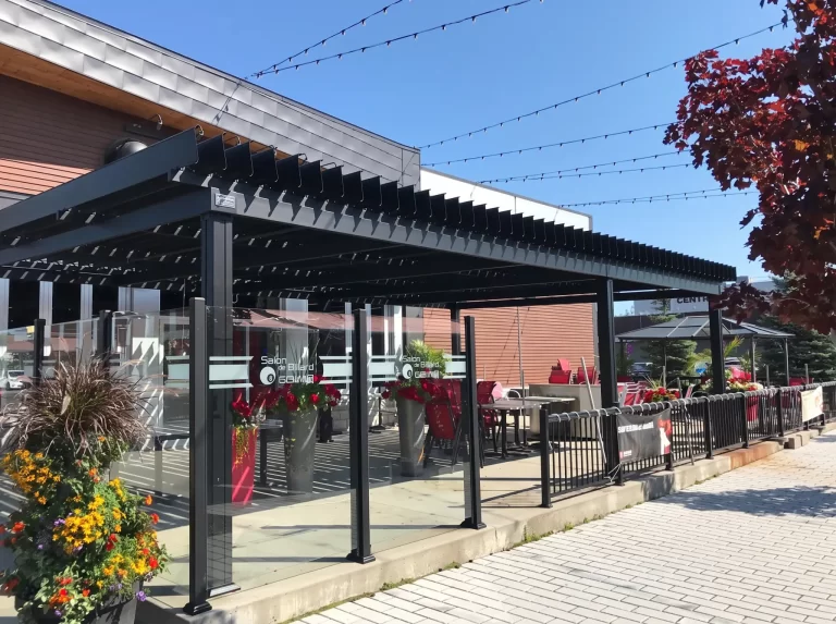 Terrace under the louvers and string lights, maple in autumn, Salon du Billard in Mégantic