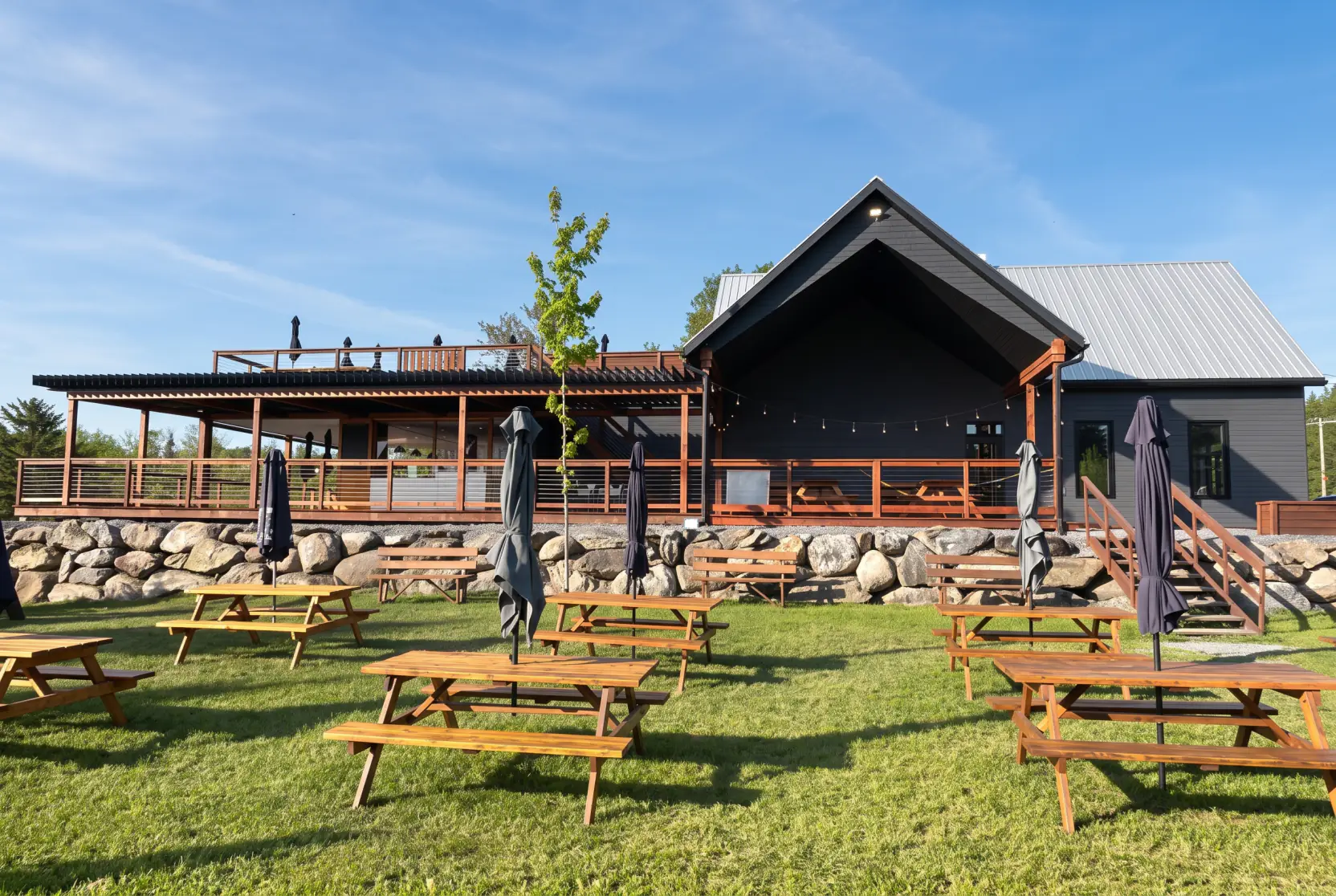 Pergola and picnic tables at the farm, Bleuetière Marland in Sainte-Marie