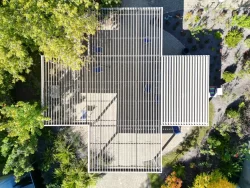 Louvered structure seen from directly above among the trees, CHSLD Jeanne-Crevier in Boucherville