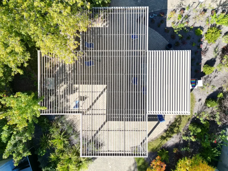 Louvered structure seen from directly above among the trees, CHSLD Jeanne-Crevier in Boucherville