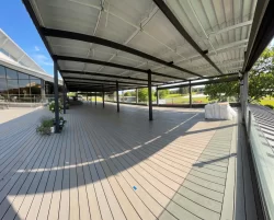 Empty wooden deck under the louvered canopy, Club de golf de la Vallée du Richelieu in Sainte-Julie