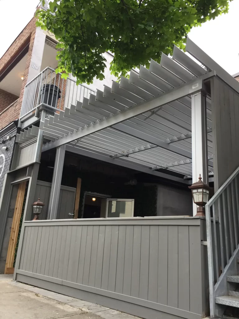 Sheltered raised terrace under a tree, Luciano Trattoria in Montréal