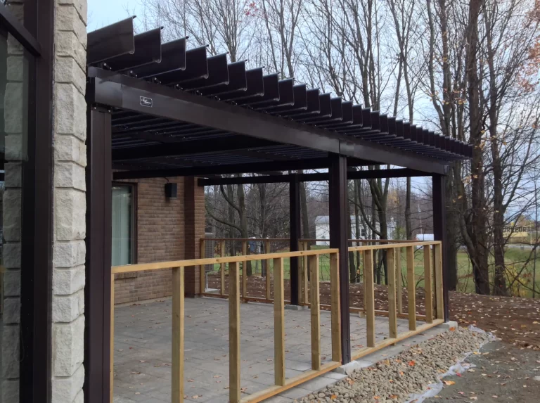 Black louvered walkway alongside the building, Saint-Alphonse-de-Granby town hall