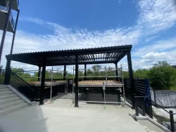 Black pergola over the pool deck, Nox Appartements in Gatineau