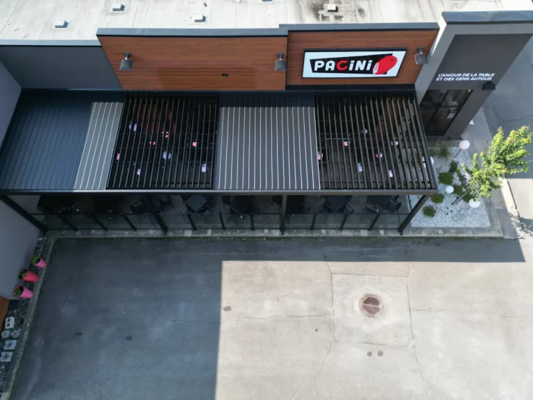 Black louvered roof seen from above over the terrace, Pacini in Granby