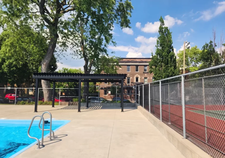 Black pergola beside the public pool, Parc Sir-George-Étienne-Cartier in Montréal