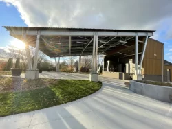 The square's canopy backlit by the sun, public square in Bromont