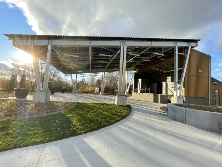The square's canopy backlit by the sun, public square in Bromont
