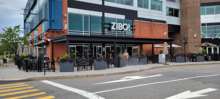 Black pergola along the restaurant frontage, Restaurant Zibo! in Laval
